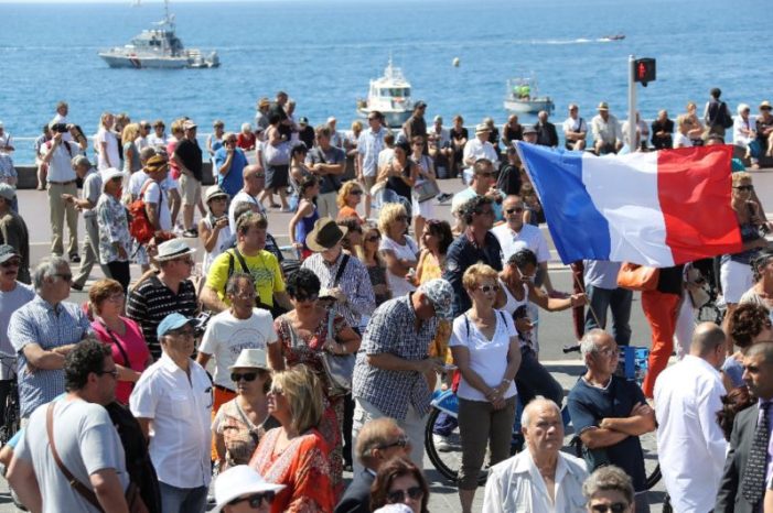 France falls silent for Nice victims, politicians bicker