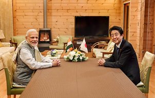 PM Modi holds informal talks with Abe; visits factory of industrial robot manufacturer