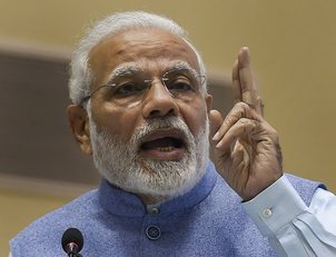 PM attacks Cong for comparing sliding rupee with his mother